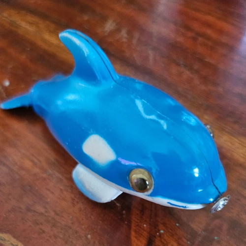 Wind-up dolphin toy like new