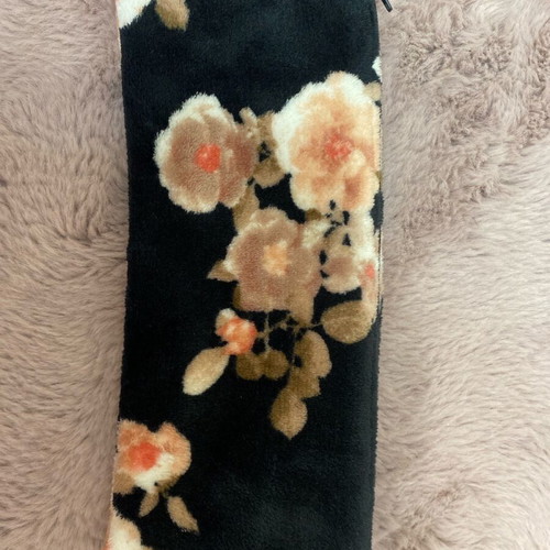 Toiletry bag like new black with flowers, spacious, rectangular