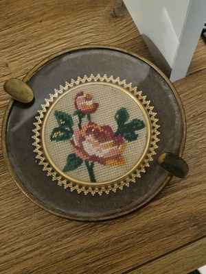 Vintage ashtray used with embroidery and tear
