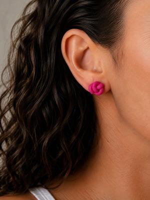 Studded fuchsia knot earrings with polymer clay