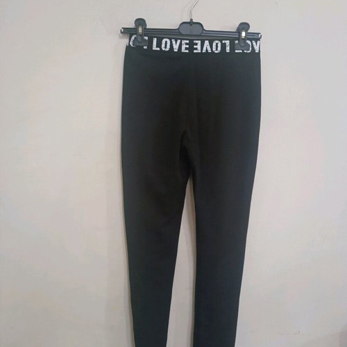 Black leggings like new with design on waistband