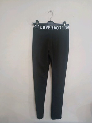 Black leggings like new with design on waistband