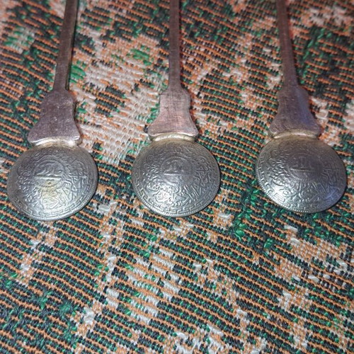 Old spoons with Arabic motifs like new