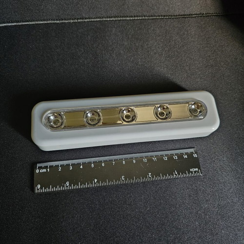 Led light new, press to turn on, with adhesive strips