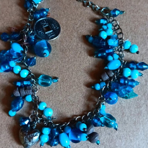 Handmade bracelet with silver chain and blue glass beads like new
