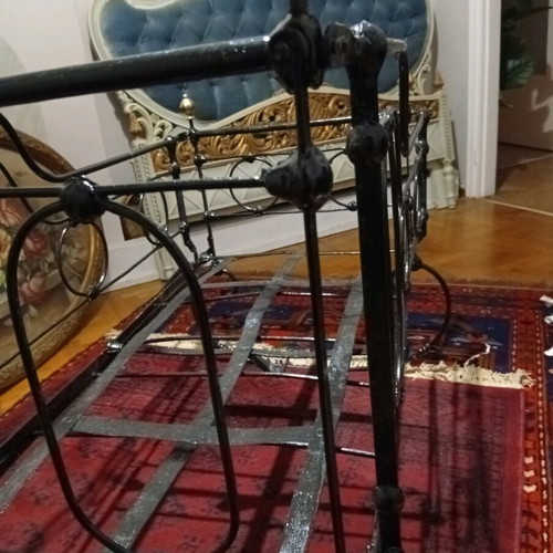 Baby cradle old handmade iron with bronze details refurbished