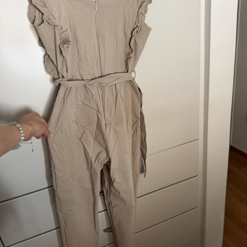 Jumpsuit with ruffles beige, one size, like new