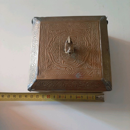Oriental copper box used with carved decorations