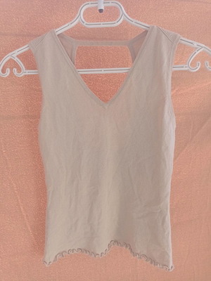 Esti beige top used with back opening, size S