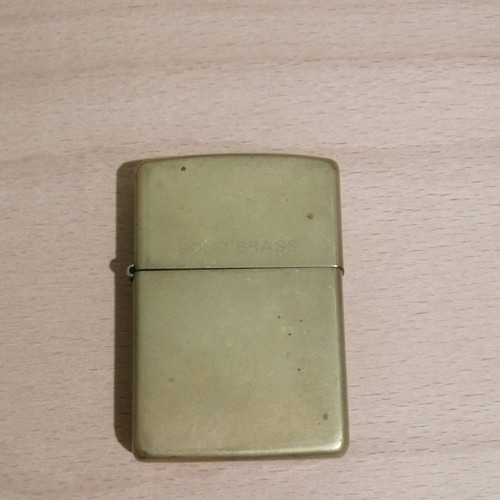 Zippo brass lighter used