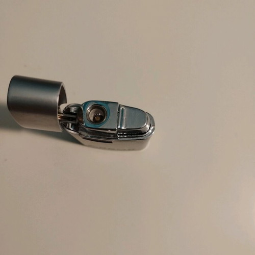 Assos International lighter used, collectible