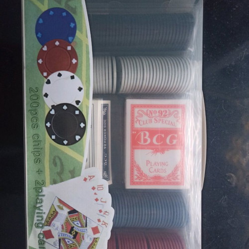 Poker set new with playing cards and chips