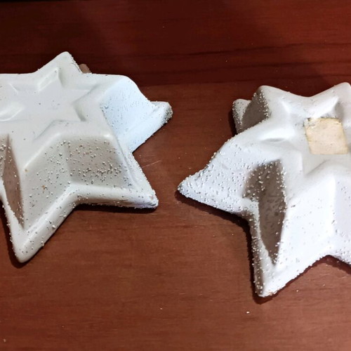 Christmas candles in clay stars with silver glitter new
