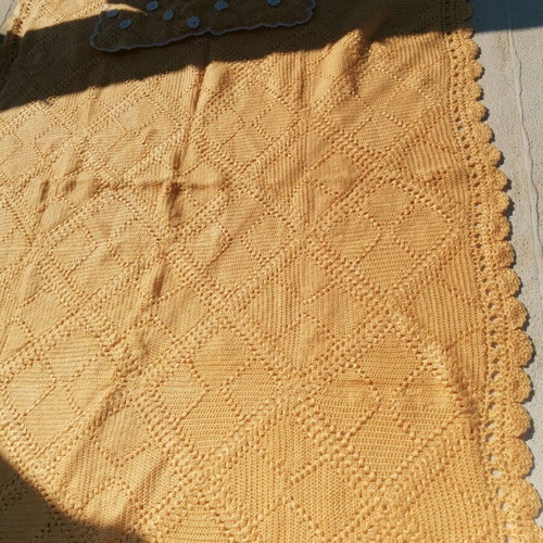 Handmade knitted blanket and pillowcase used