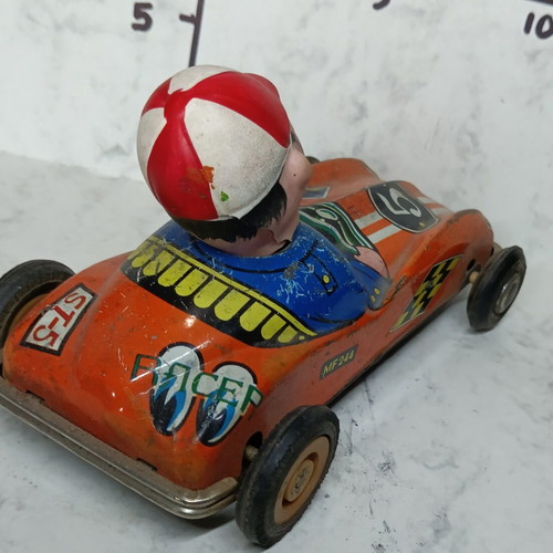 Collectible tin wind-up racing car from the 70s used