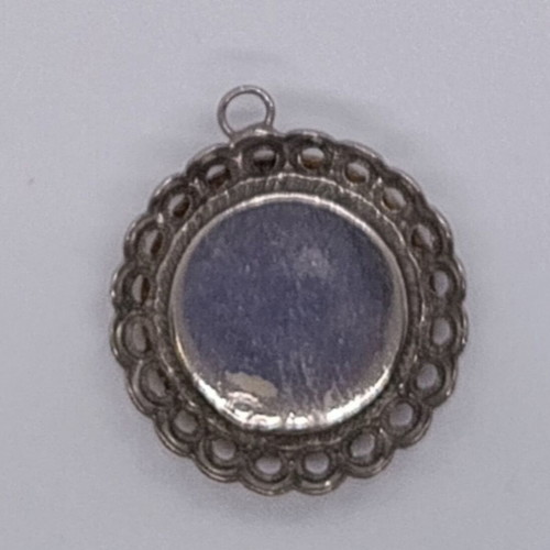 Embossed Gemini pendant like new, silver