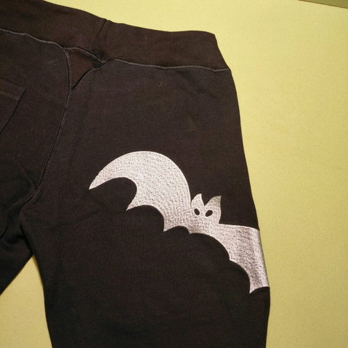 I.4.U Capri Pants Black with Silver Thread Bat Design like New