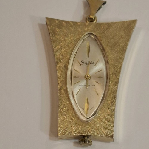 Vintage Sheffield gold tone watch uniquely shaped 1970s used, not working