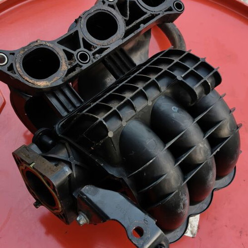 Mitsubishi Colt VI 1.1L Intake Manifold used OEM MN143824