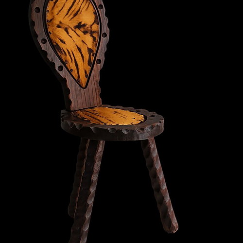 Spanish rustic chair used with three legs and animal leather