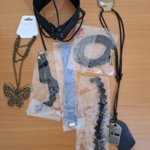 Jewelry set new with seven pairs of earrings, five chokers, and chains