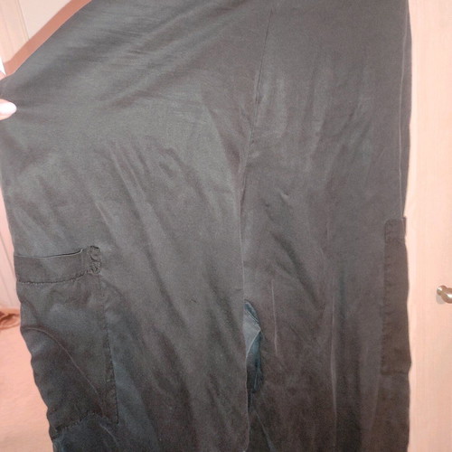 One-piece jumpsuit used, black with side pockets