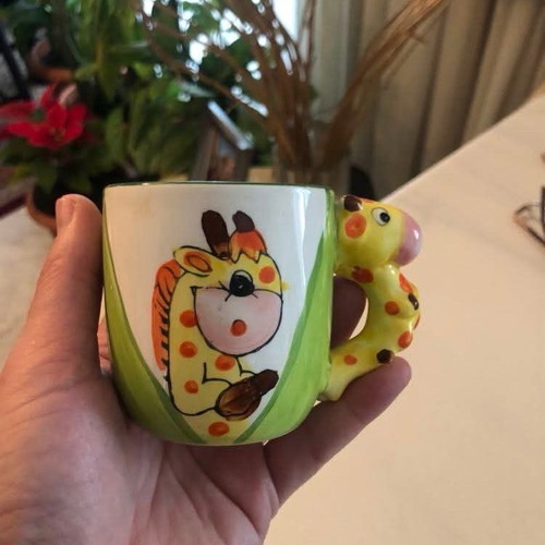 Mug like new with giraffe design