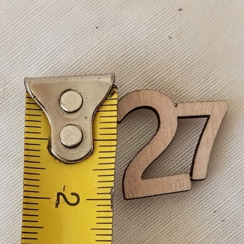 Wooden laser-cut number 27 elements, set of 10