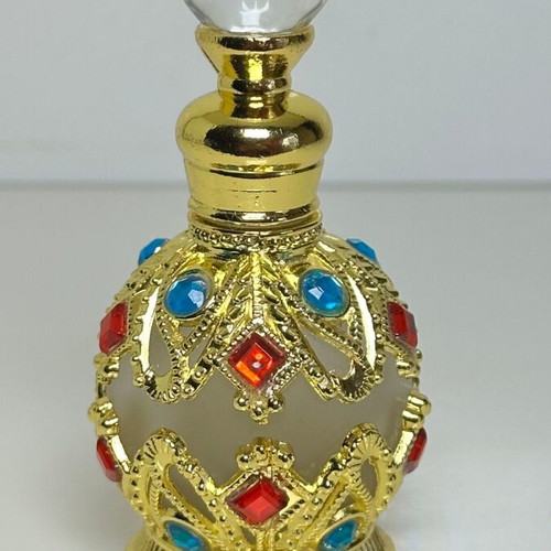 Vintage Arabic perfume bottle with gold metal frame and stones