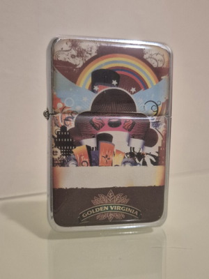Collectible gasoline lighter with rainbow design, like new