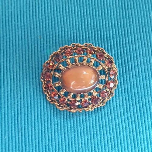 Vintage brooch used, gold color with crystals and cabochon