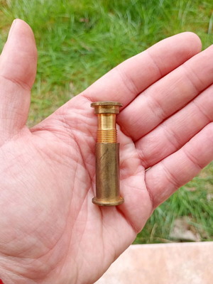 Vintage brass door peephole used, old door viewer