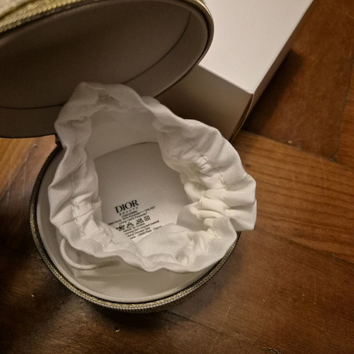 Christian Dior circular jewelry case new, gold color