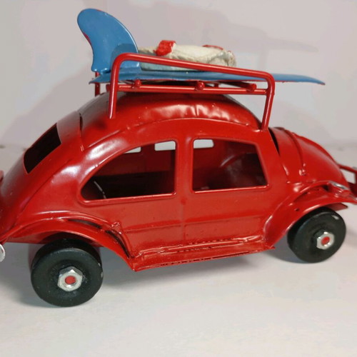 Red metal Scarab used