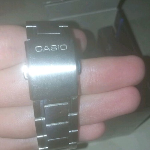 Casio men's watch with blue dial and silver bracelet, new
