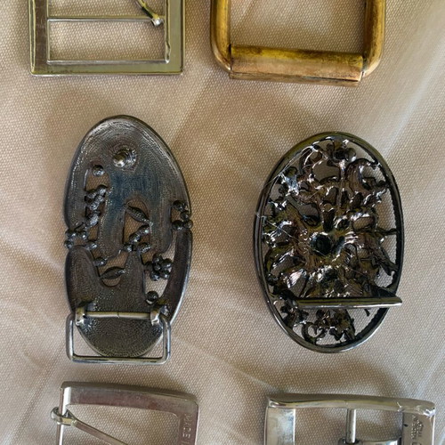 Six belt buckles, used, assorted condition, pack