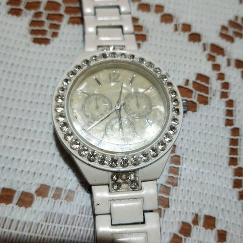 Avon watch used with white strap
