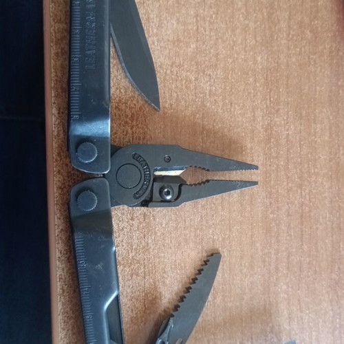 Leatherman Rebar Black Oxide multitool like new with case and box