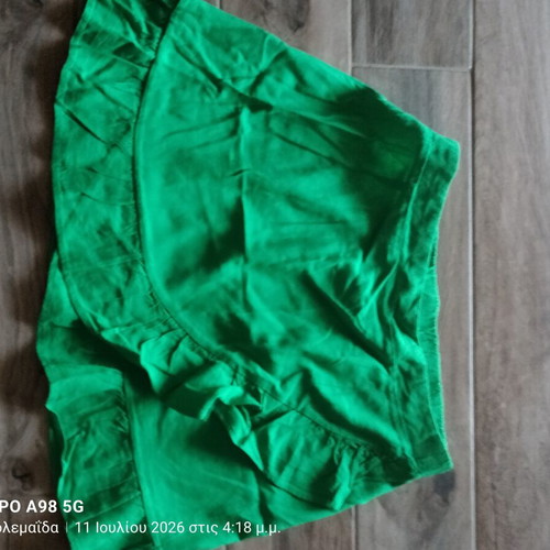 Anel green short skirt like new with ruffles, size L 40 12