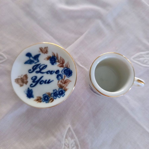 Vintage porcelain miniature set cup and saucer I Love You with gold trim like new
