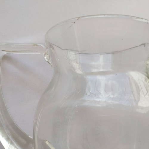 Cut glass pitcher used with minor wear