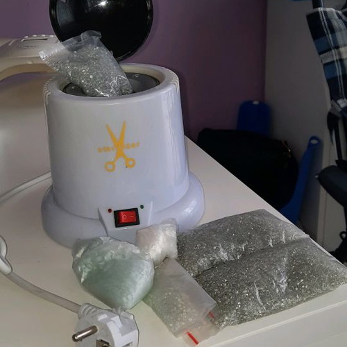 Tool sterilizer with microspheres used