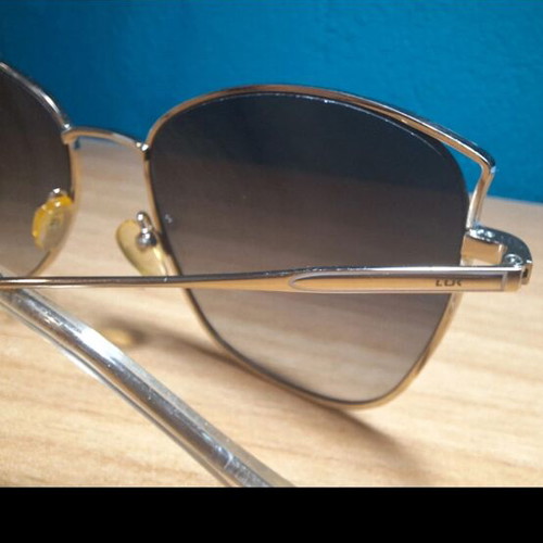 Mati Mati Lük sunglasses like new, white and brown