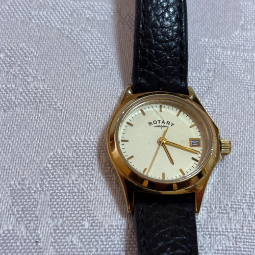 Rotary women's watch gold, like new, classic dial with date