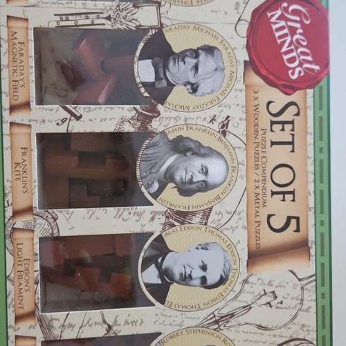 Great Minds Puzzle Set of 5 like new, 3 wooden and 2 metal puzzles