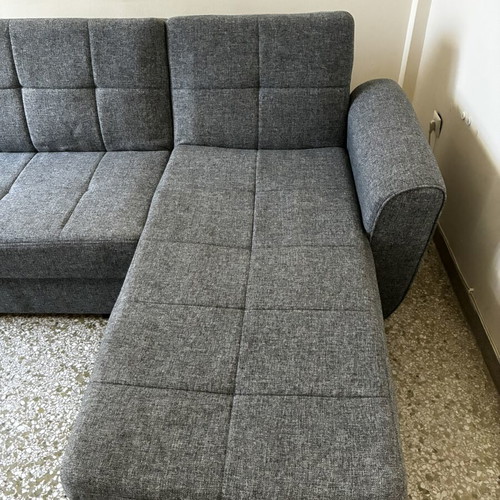 Corner sofa bed with storage compartments