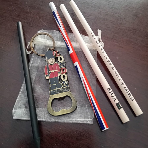 English pencils and souvenir keychain with bottle opener new