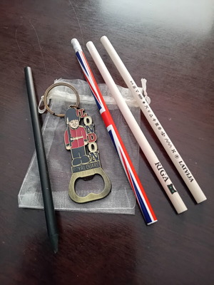 English pencils and souvenir keychain with bottle opener new