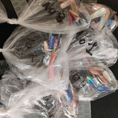 Fake plastic nails like new with base and clear polish