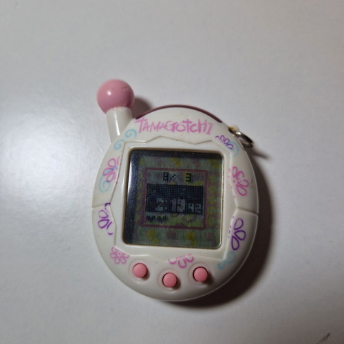 Tamagotchi like new and functional